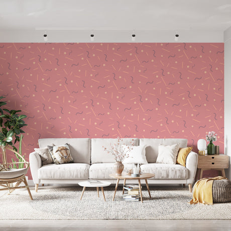 Modern pink geometric wallpaper with Memphis pattern styled in a bright home office showing playful shapes and lines