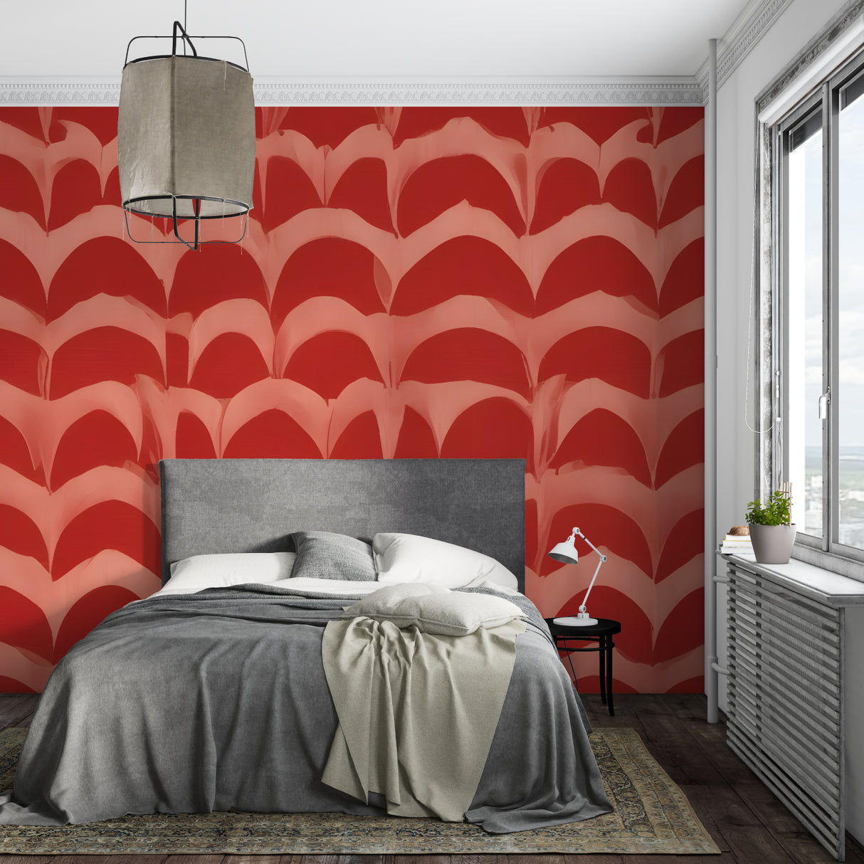 Geometric red wave wallpaper adding energy to a contemporary bedroom wall