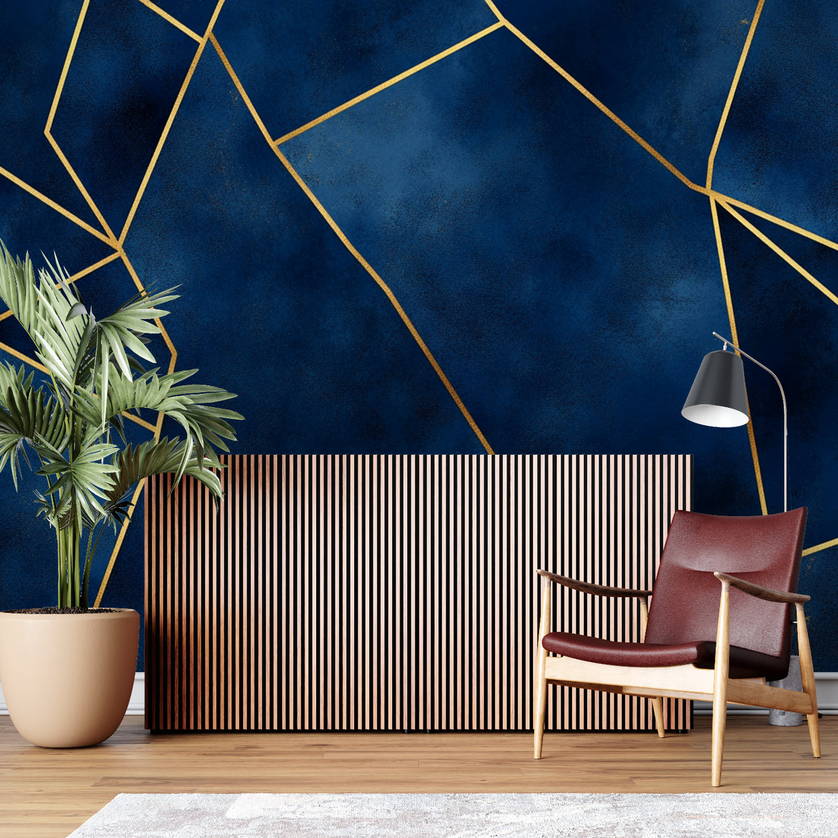 Geometric navy and gold wallpaper in modern living room setting with clean furniture and natural light