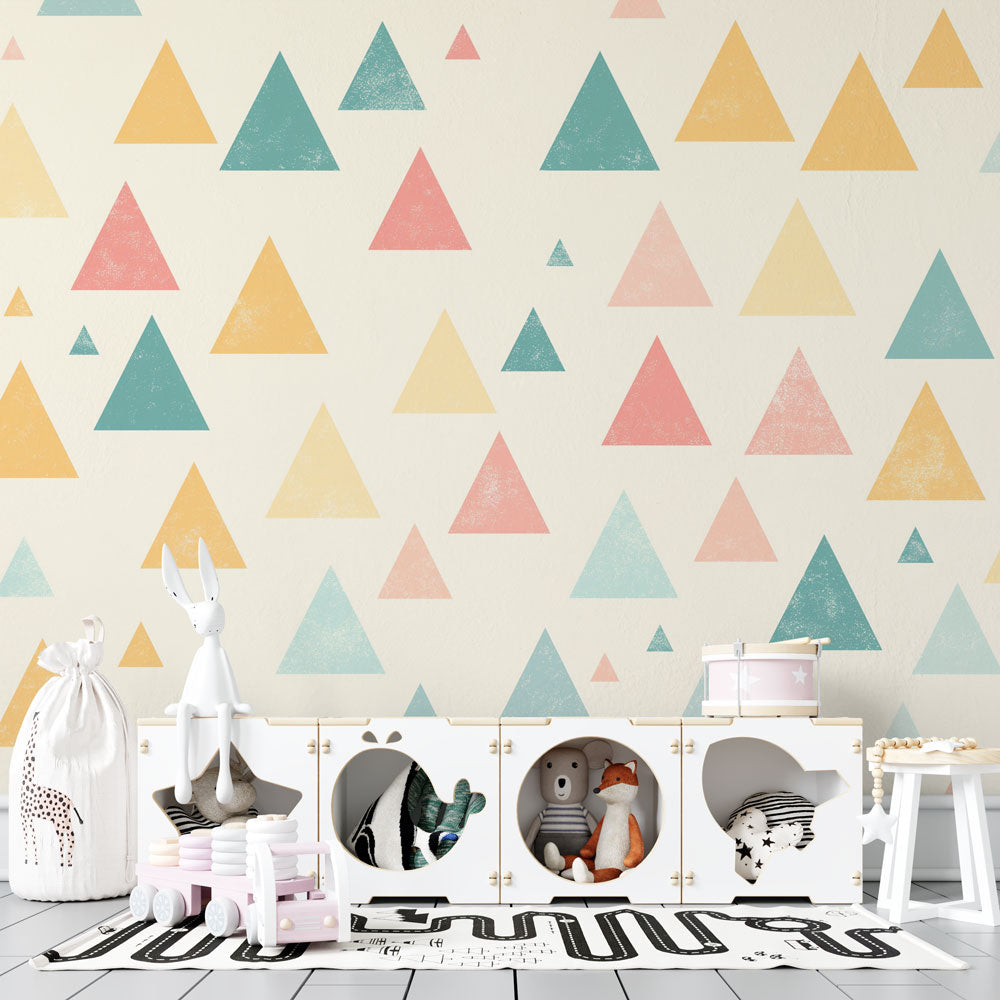 Geometric triangle wallpaper in modern nursery showing soft pastel pattern creating a calm and playful atmosphere