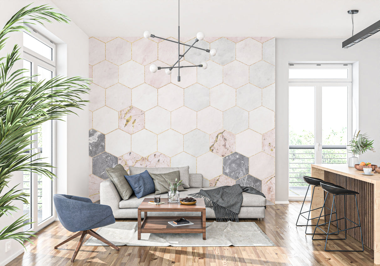 Pink and grey marble hexagon wallpaper with gold accents in a modern living room setting