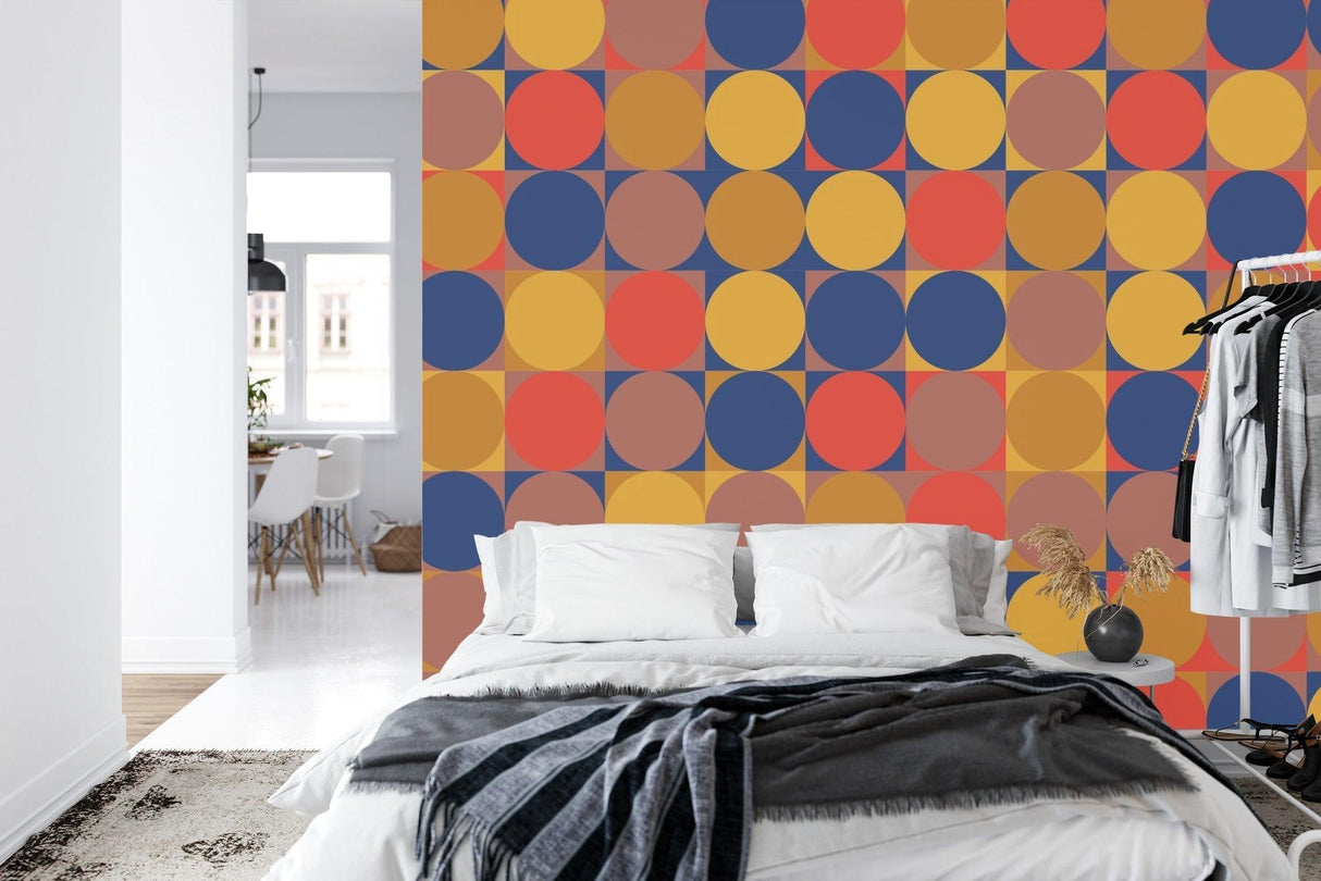 Geometric circle wallpaper in modern living room showing navy and terracotta pattern creating depth