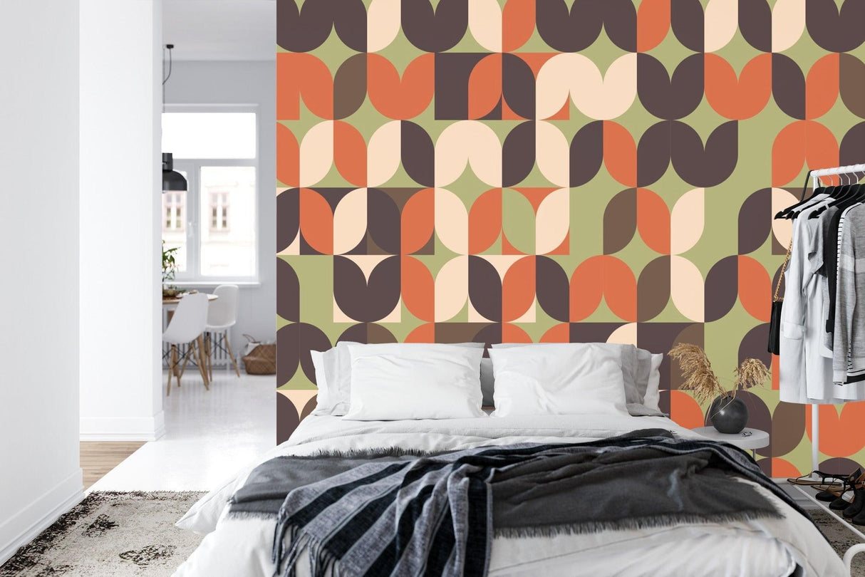 Mid-century geometric wallpaper in home office with warm earth tones