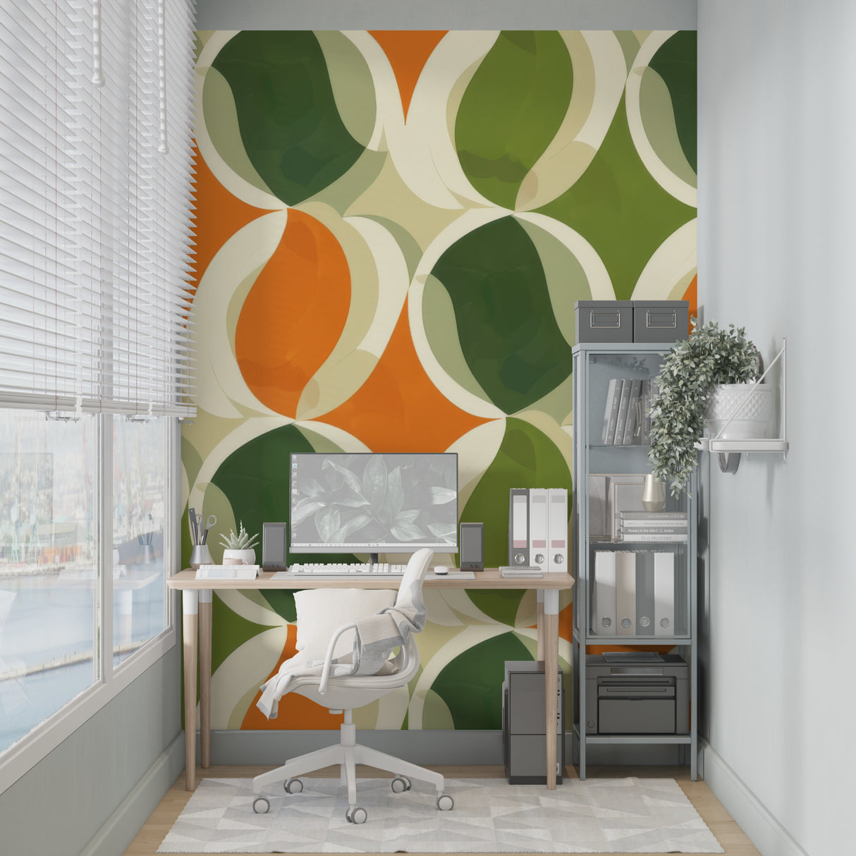 Home office space with retro geometric wallpaper showing vibrant orange and green circles