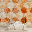 Geometric circular mosaic wallpaper in modern living room showing warm terracotta tones against white furniture