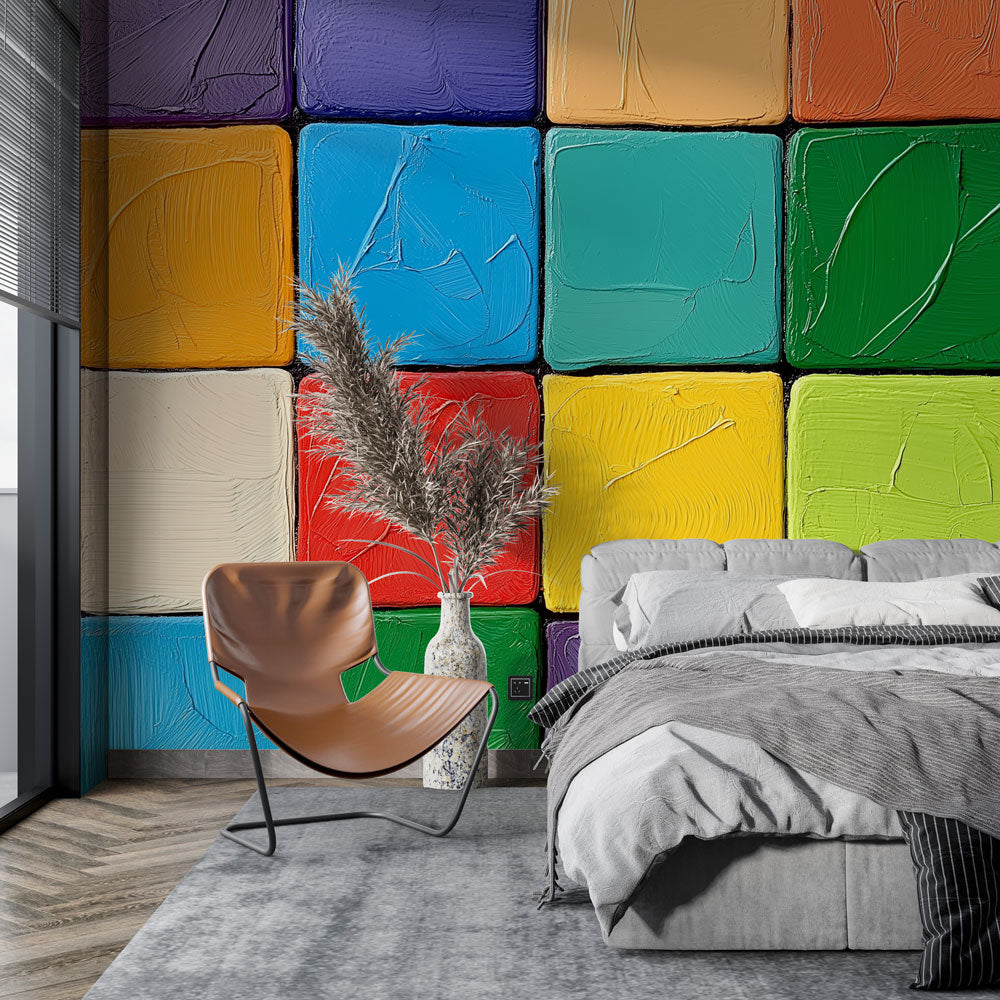 Modern geometric rainbow wallpaper bringing life to a bright home office space with natural lighting