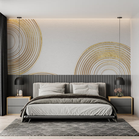 Gold circle geometric wallpaper creating depth in modern living room with grey sofa and natural light