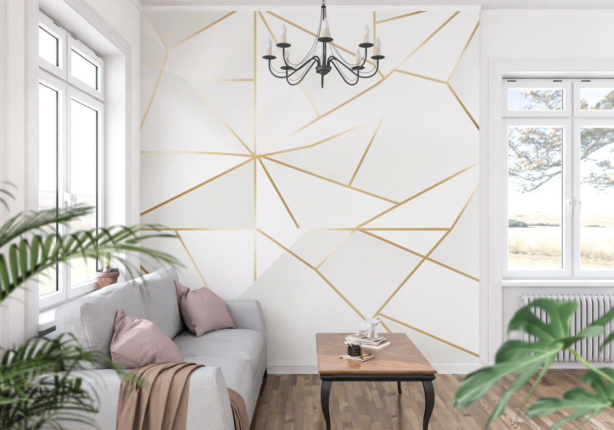 Geometric gold wallpaper in bright modern living room showing clean lines and contemporary style