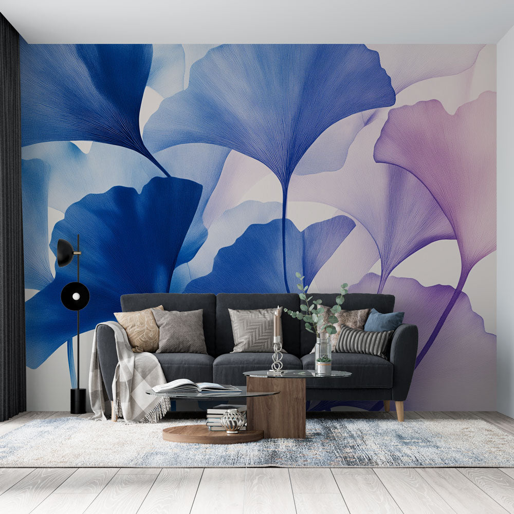 Modern Ginkgo leaf wallpaper in blue and purple tones creating a peaceful atmosphere in a minimalist living room