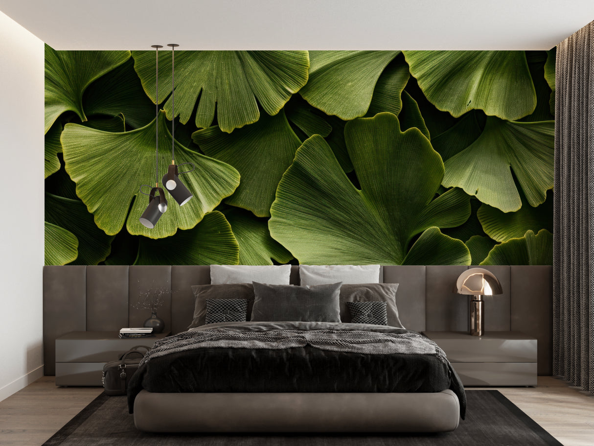 Botanical wall mural featuring ginkgo leaves in a bright home office setting