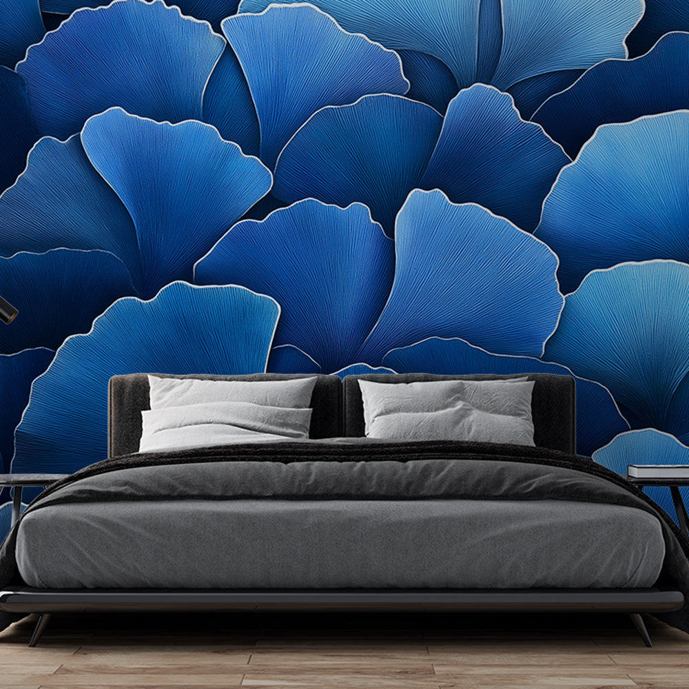 Modern blue Ginkgo leaf wallpaper creating a peaceful atmosphere in a bright living room with minimal furniture
