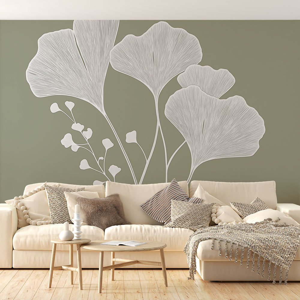 White Ginkgo botanical line art wallpaper creating a serene atmosphere in a modern living room with minimal furniture