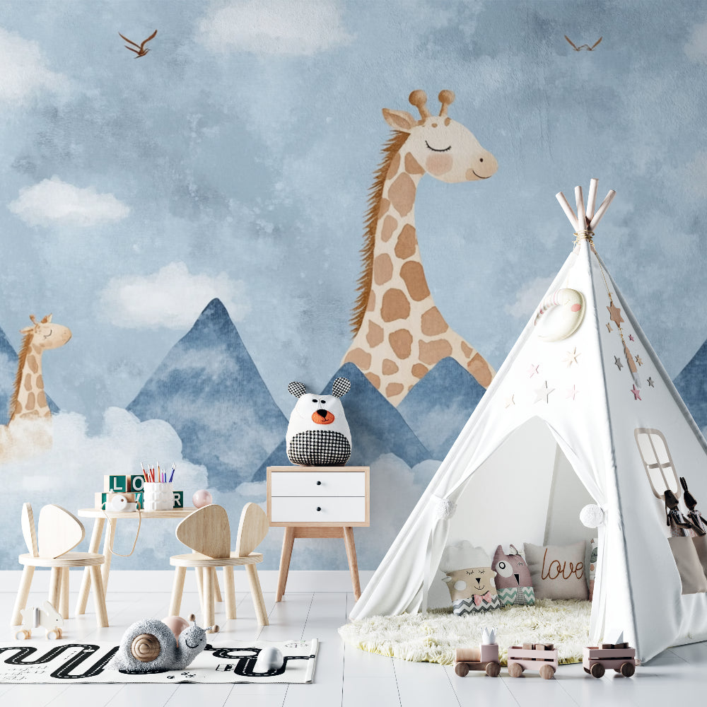 Playroom transformed with giraffe and mountain wallpaper mural, showcasing reading nook setup