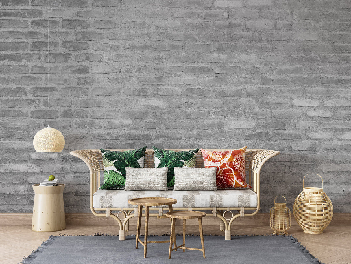 Grey brick wallpaper in modern living room with leather sofa and industrial lighting