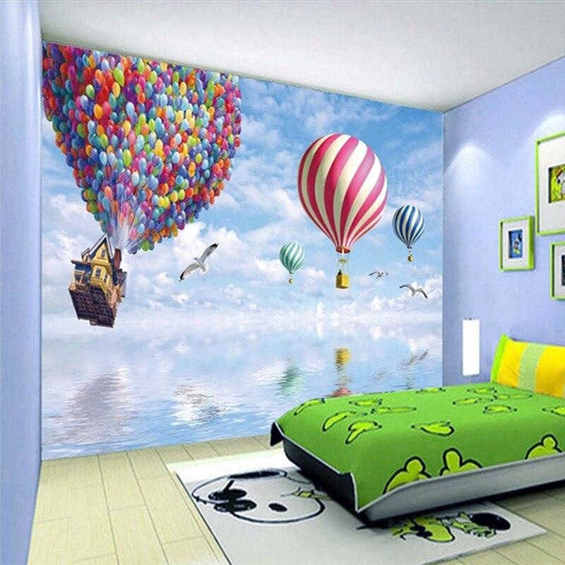 Bedroom featuring fantasy sky wallpaper with vibrant hot air balloons and dreamy clouds