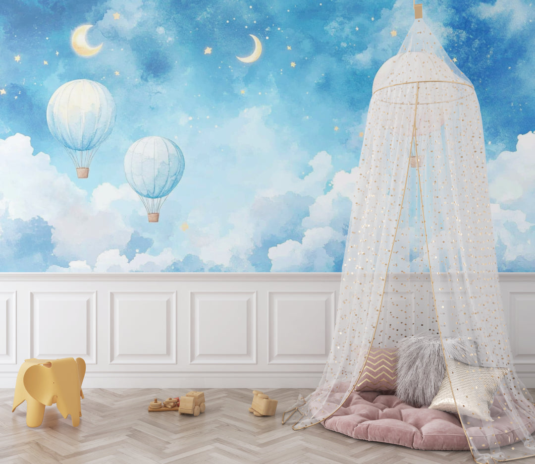 Night sky balloon mural in a child's reading nook with comfortable seating and dreamy atmosphere