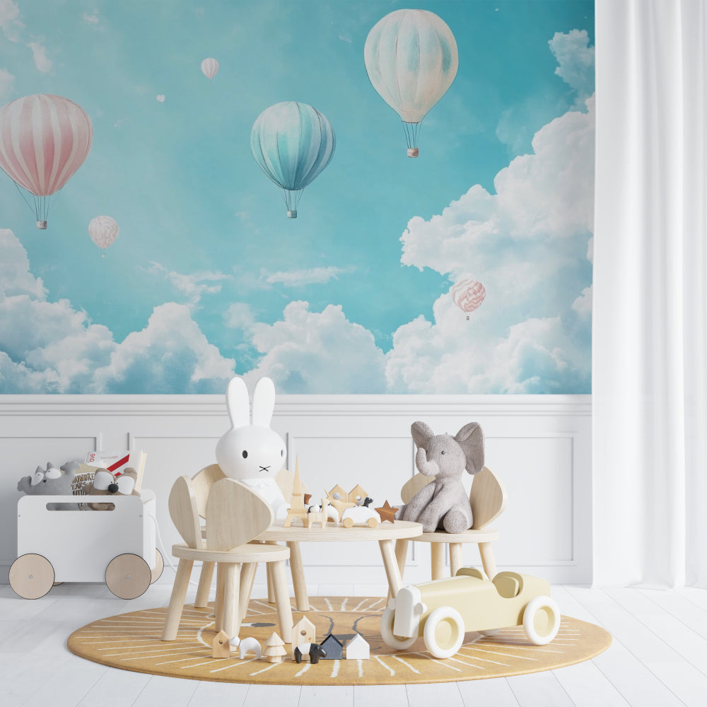 Baby room with hot air balloon wallpaper showing gentle pastel colors and clouds