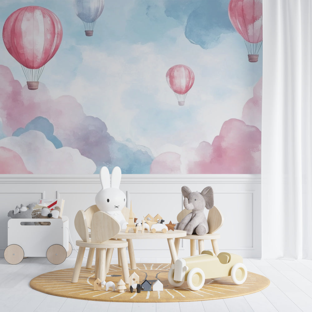 Pink and blue hot air balloon mural bringing whimsy to a child's bedroom with natural lighting
