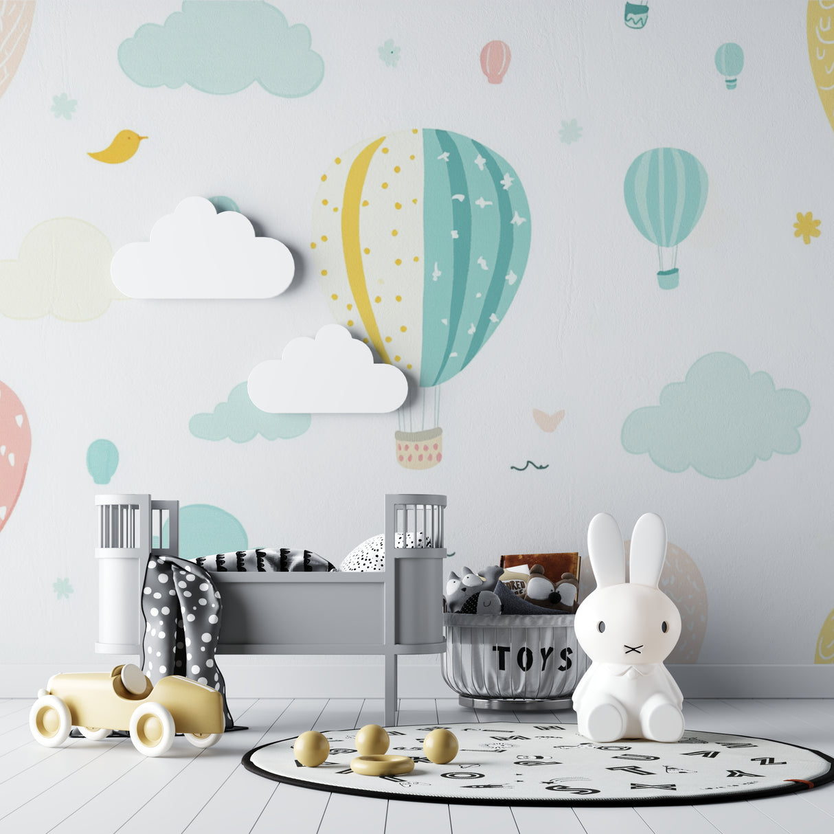 Playroom wall decorated with pastel hot air balloon mural