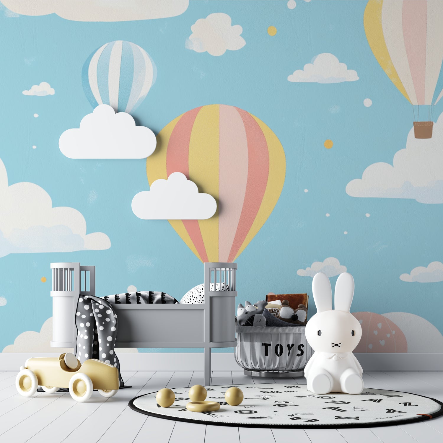 Playroom with balloon wallpaper mural showing peaceful sky scene and gentle pastel tones