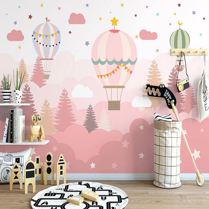 Pink forest hot air balloon mural installed in a kids bedroom, showing playful design with starry details