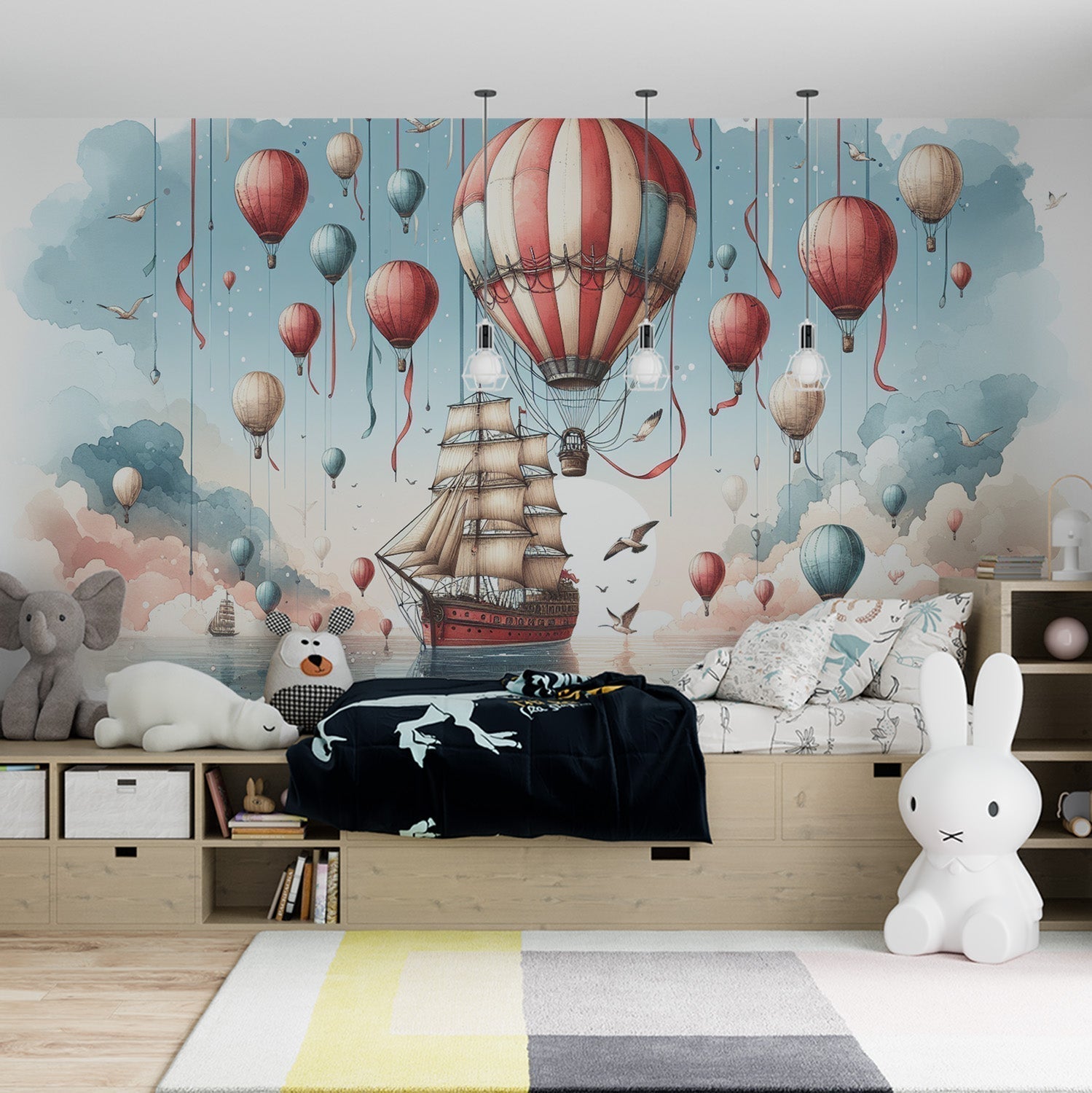 Hot air balloon wallpaper creating a dreamy atmosphere in a bright nursery with natural light and wooden furniture