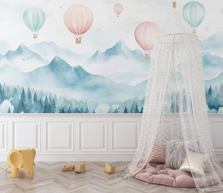 Hot air balloon wallpaper in a bright nursery, pink and mint balloons floating above misty mountains