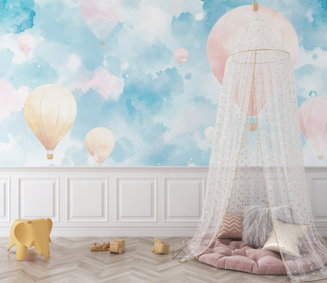 Hot air balloon nursery wallpaper creating a dreamy atmosphere in a modern white nursery with minimal furniture