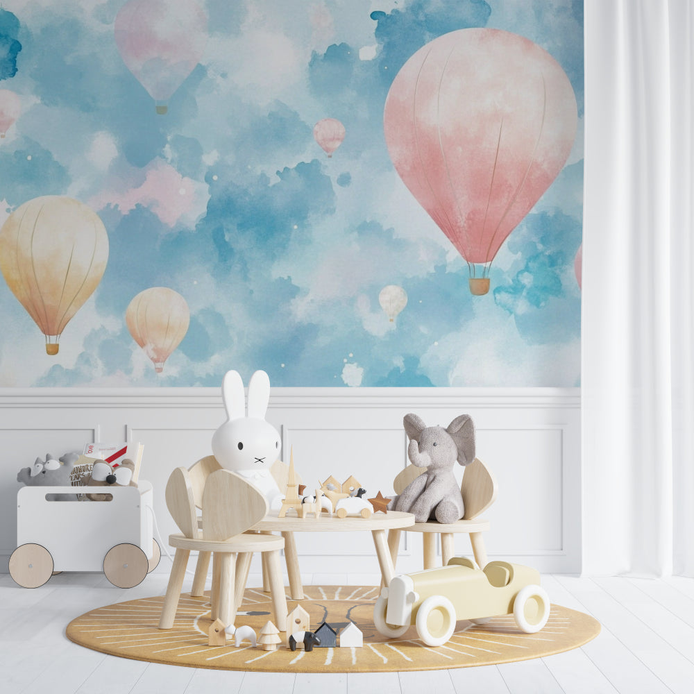 Pastel hot air balloon wallpaper brightening a child's reading nook with cozy cushions