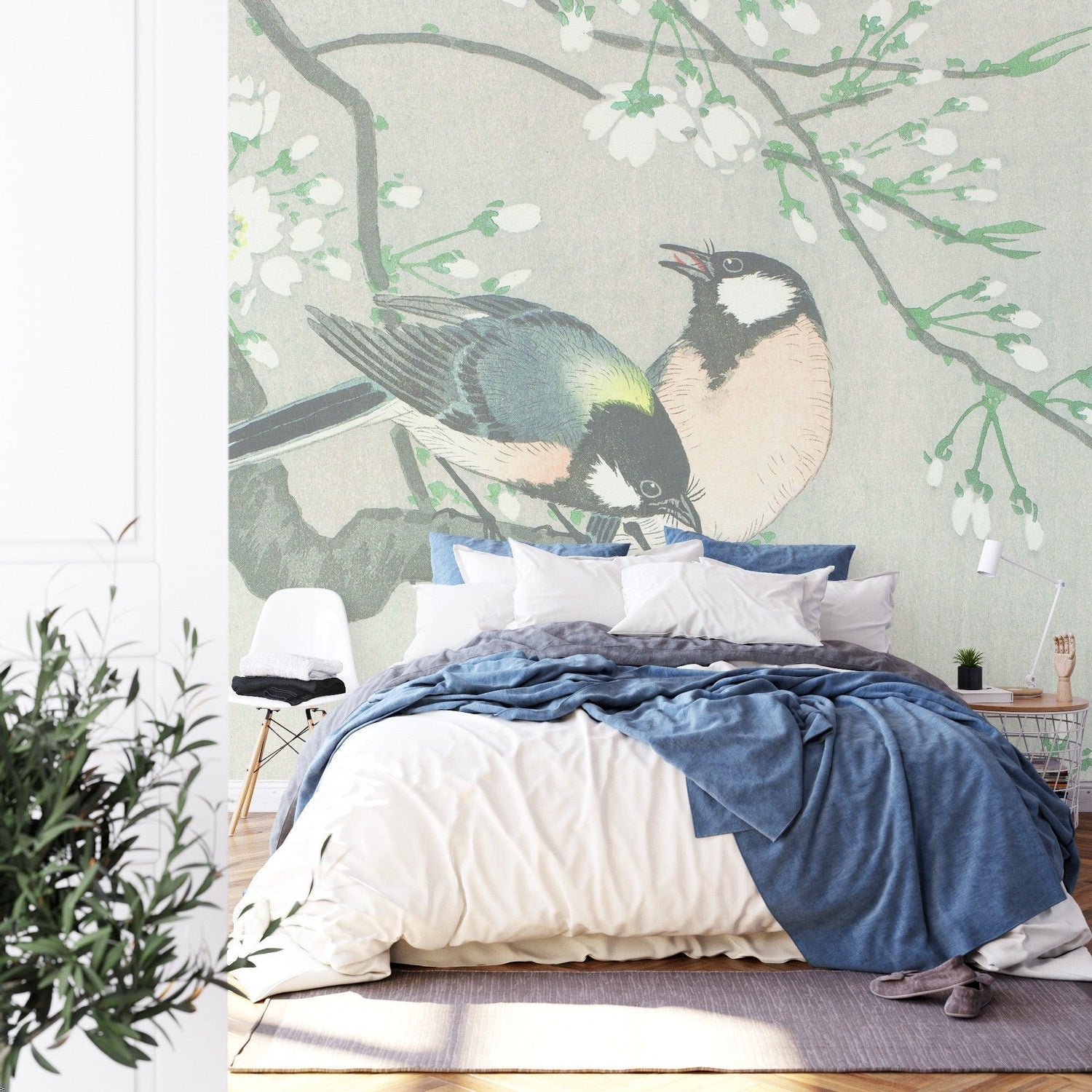 Japanese bird mural in dining room with natural lighting highlighting cherry blossoms