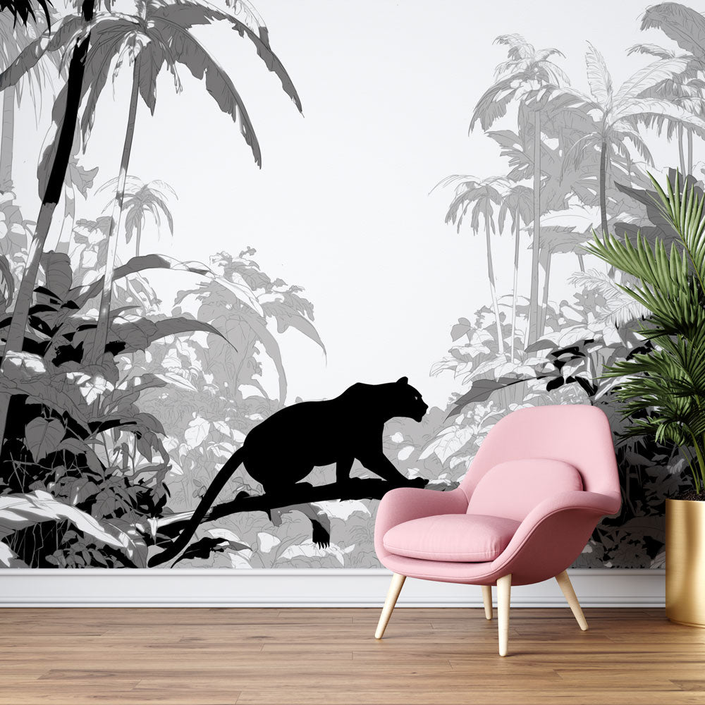Black Panther jungle wallpaper creating drama in a modern living room with minimal furniture and natural light