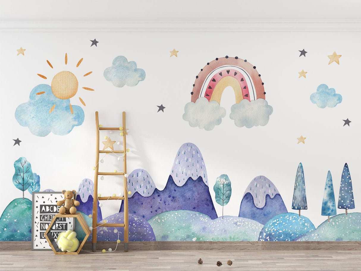 Rainbow nursery wallpaper creates a dreamy backdrop for a white crib setup