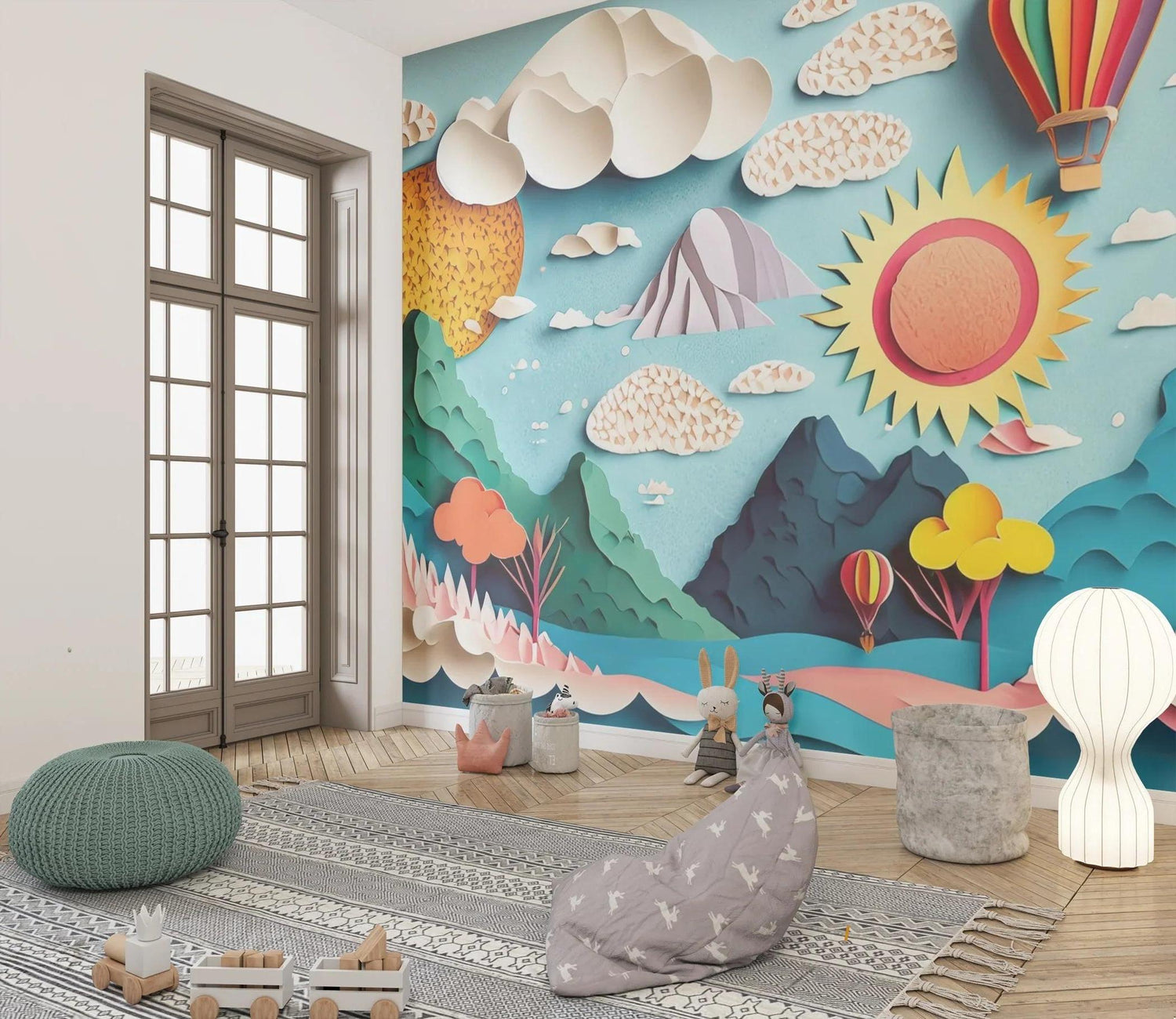 Mountain paper-cut wallpaper in a modern playroom setting, highlighting the turquoise sky and hot air balloons