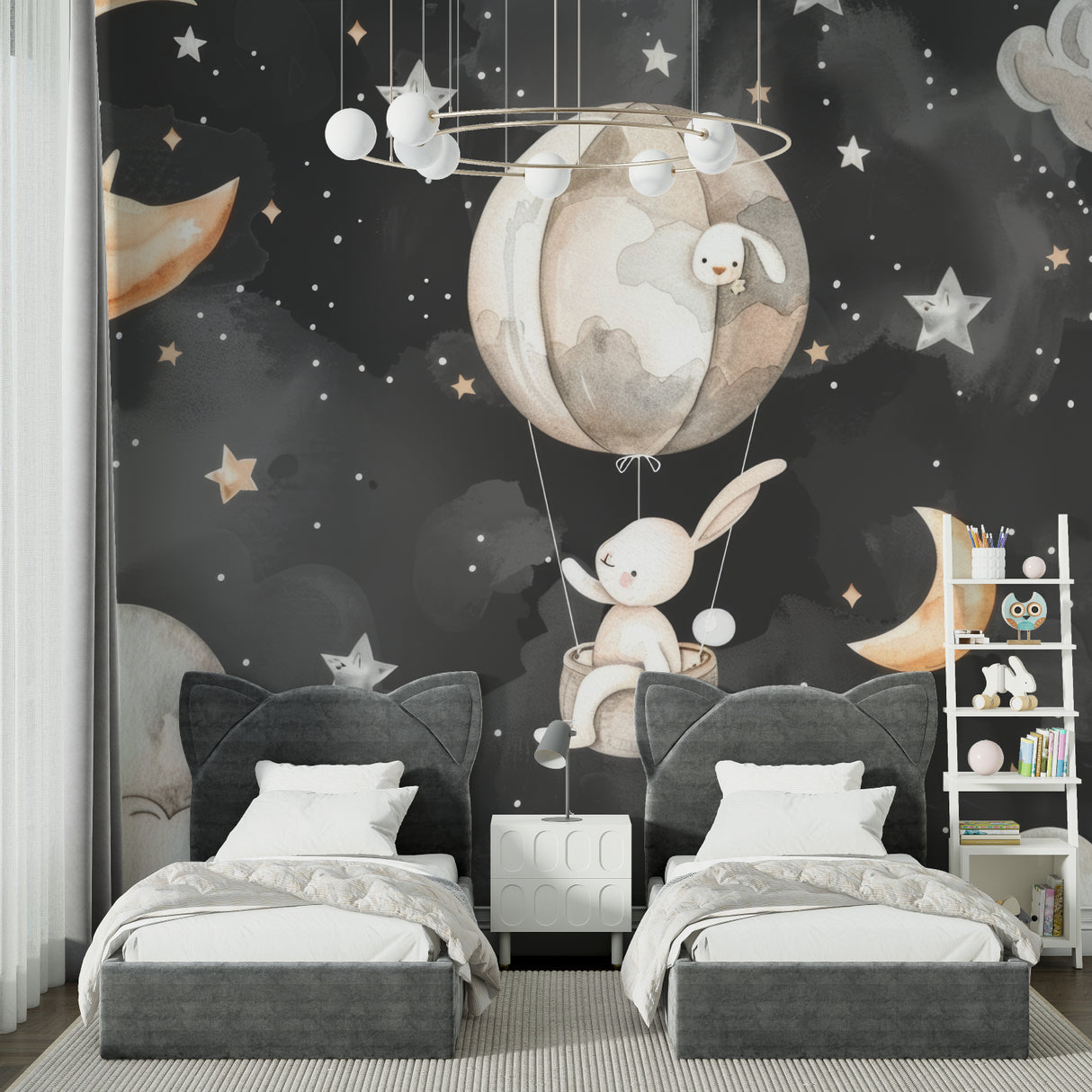 Night sky bunny mural wallpaper displayed in a cozy reading nook with rocking chair