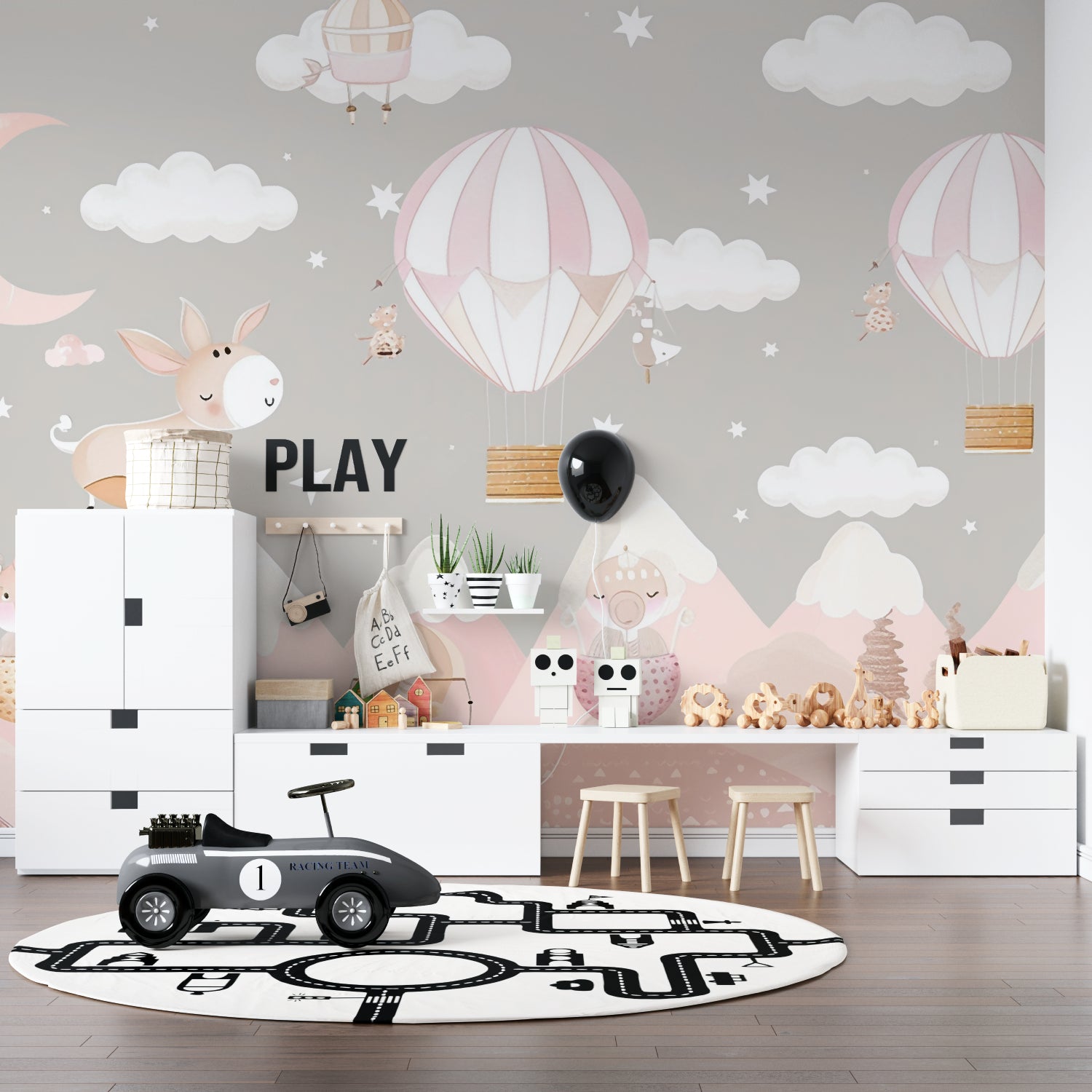 Cloud and balloon mural in kids playroom with reading nook