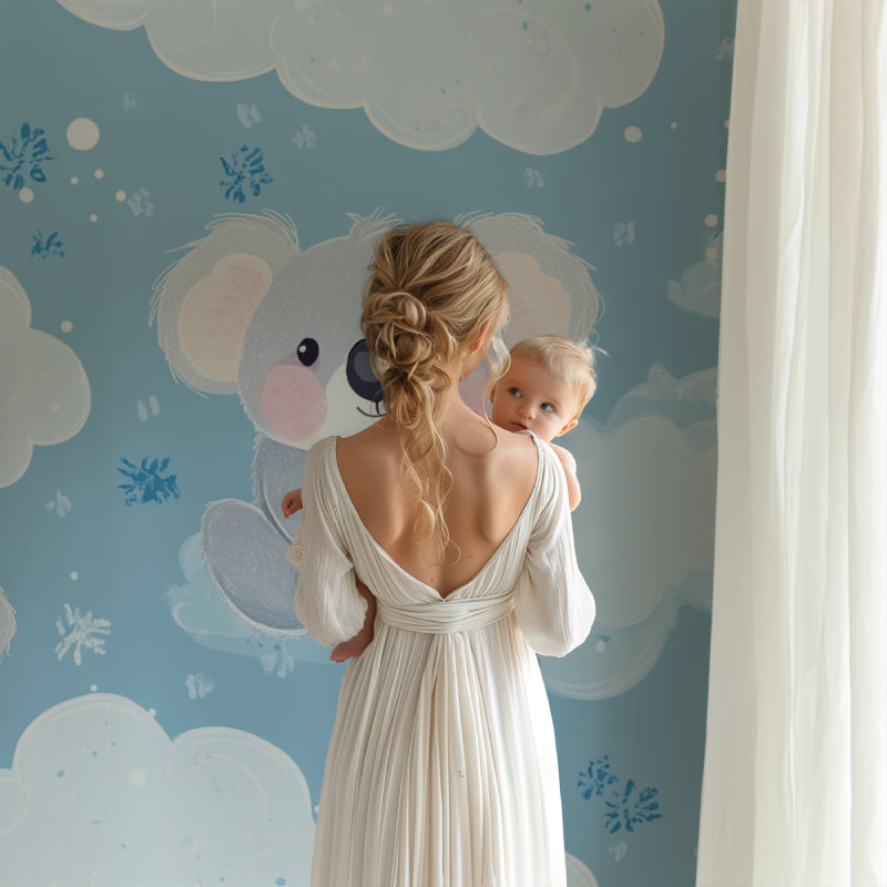 Dreamy koala wallpaper installed in a modern children's bedroom with minimal decor