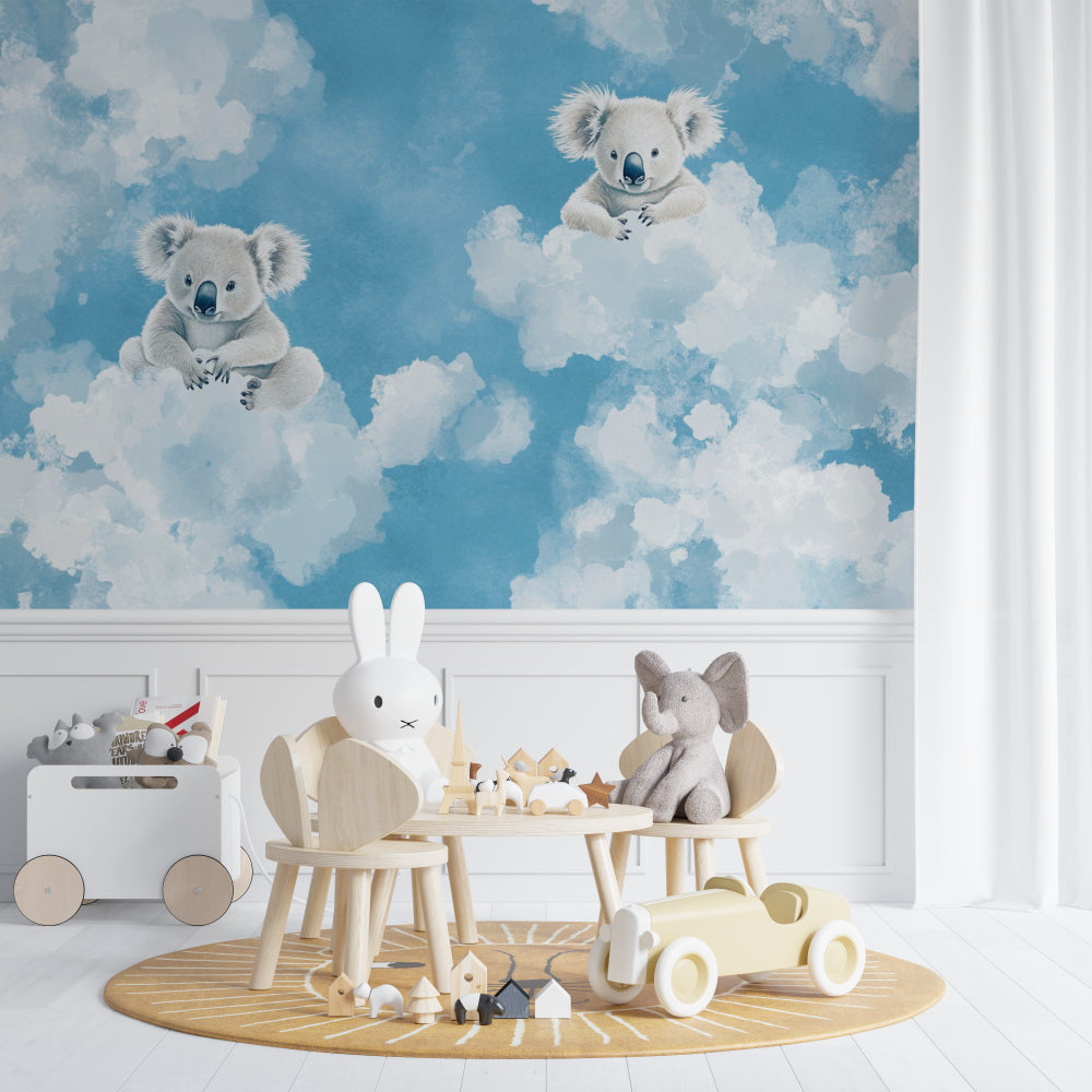 Kids bedroom featuring dreamy koala wallpaper with soft blue lighting creating a peaceful atmosphere