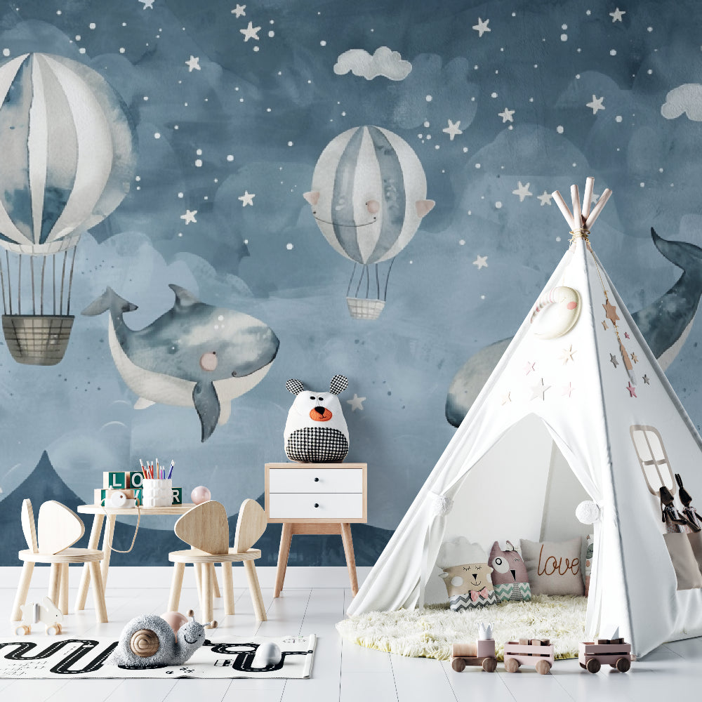 Playroom wall decorated with whales and balloons mural wallpaper