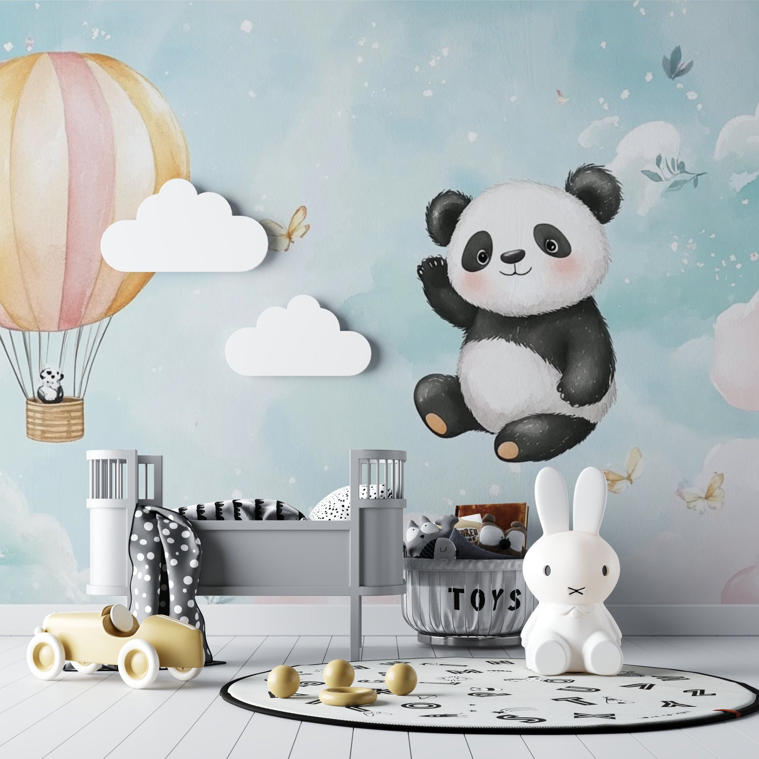 Panda hot air balloon wallpaper creates a magical atmosphere in a toddler's bedroom