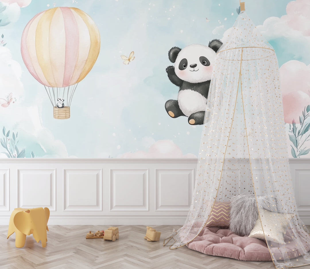 Nursery wall mural featuring floating panda and hot air balloon in reading nook
