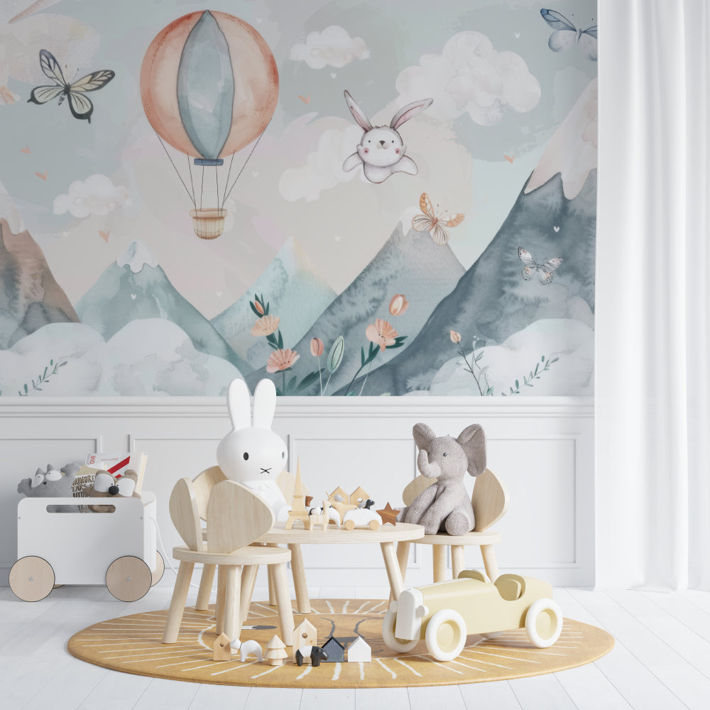 Nursery wall mural with hot air balloon and bunny in a playroom setting
