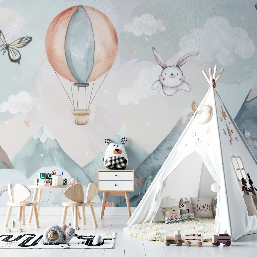 Baby room featuring whimsical hot air balloon wallpaper with soft lighting