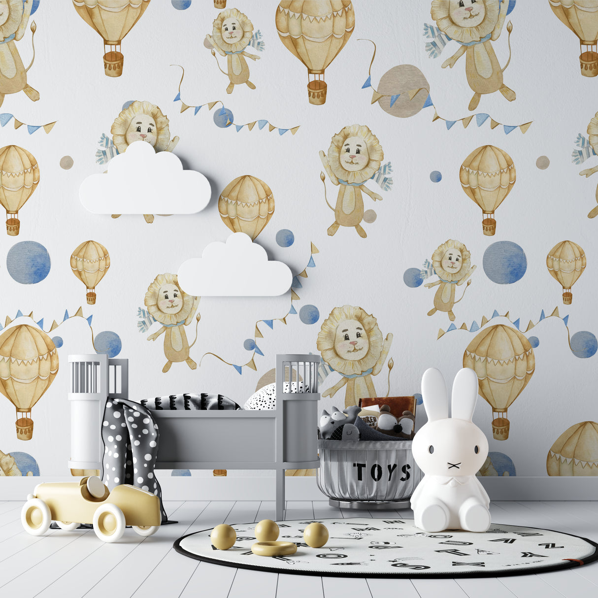 Lions and balloons wall mural creating a cozy reading corner in a kids bedroom