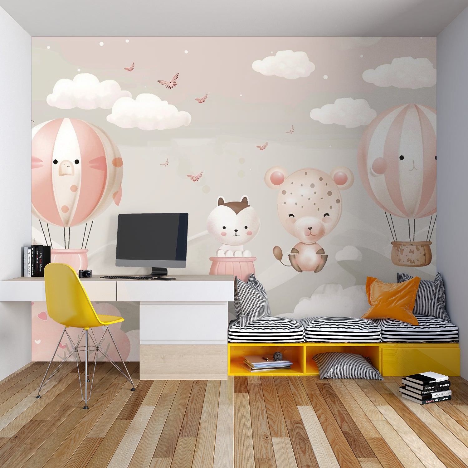 Children's bedroom featuring hot air balloon wallpaper mural with playful animals
