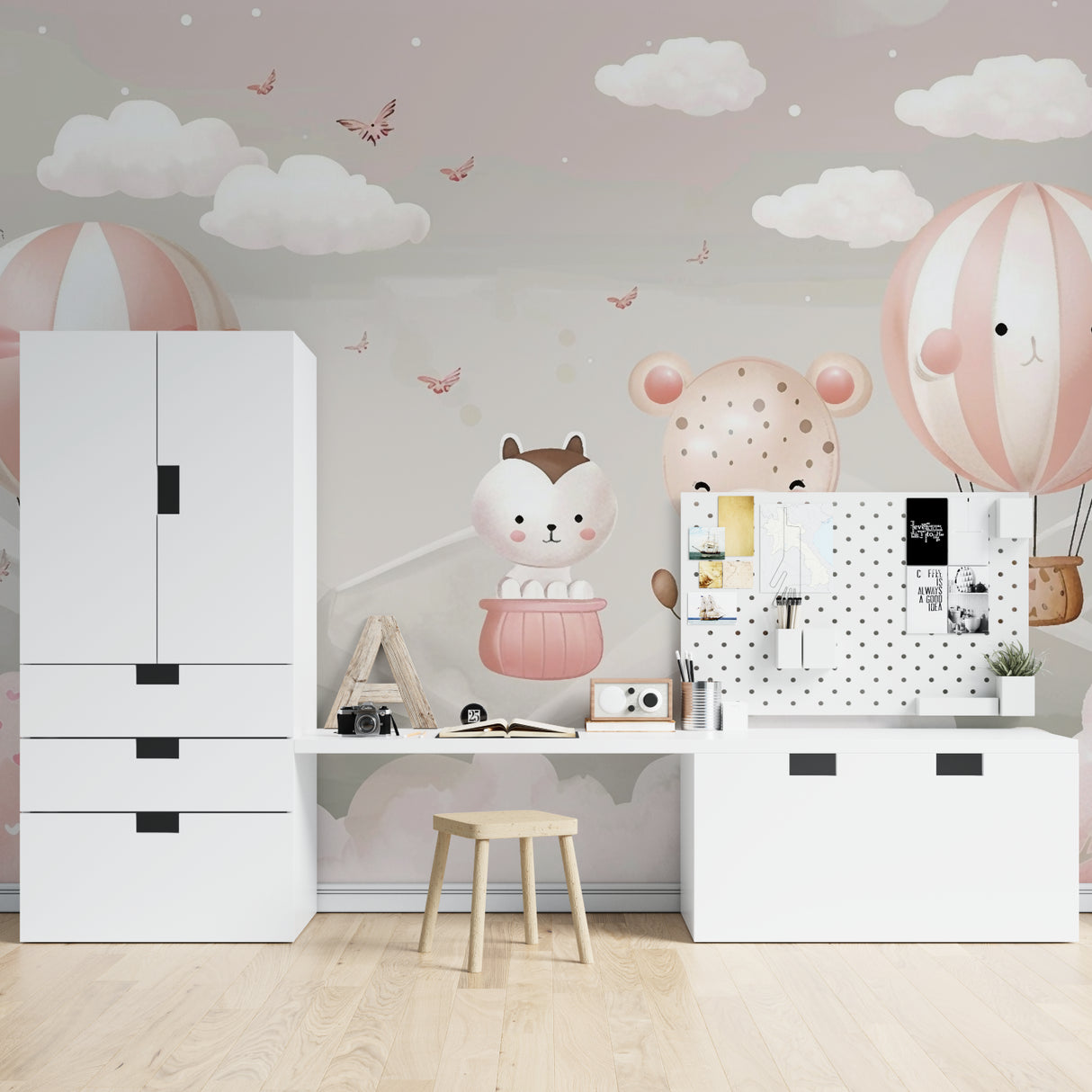 Playroom with hot air balloon wall mural showcasing soft pink and gray tones