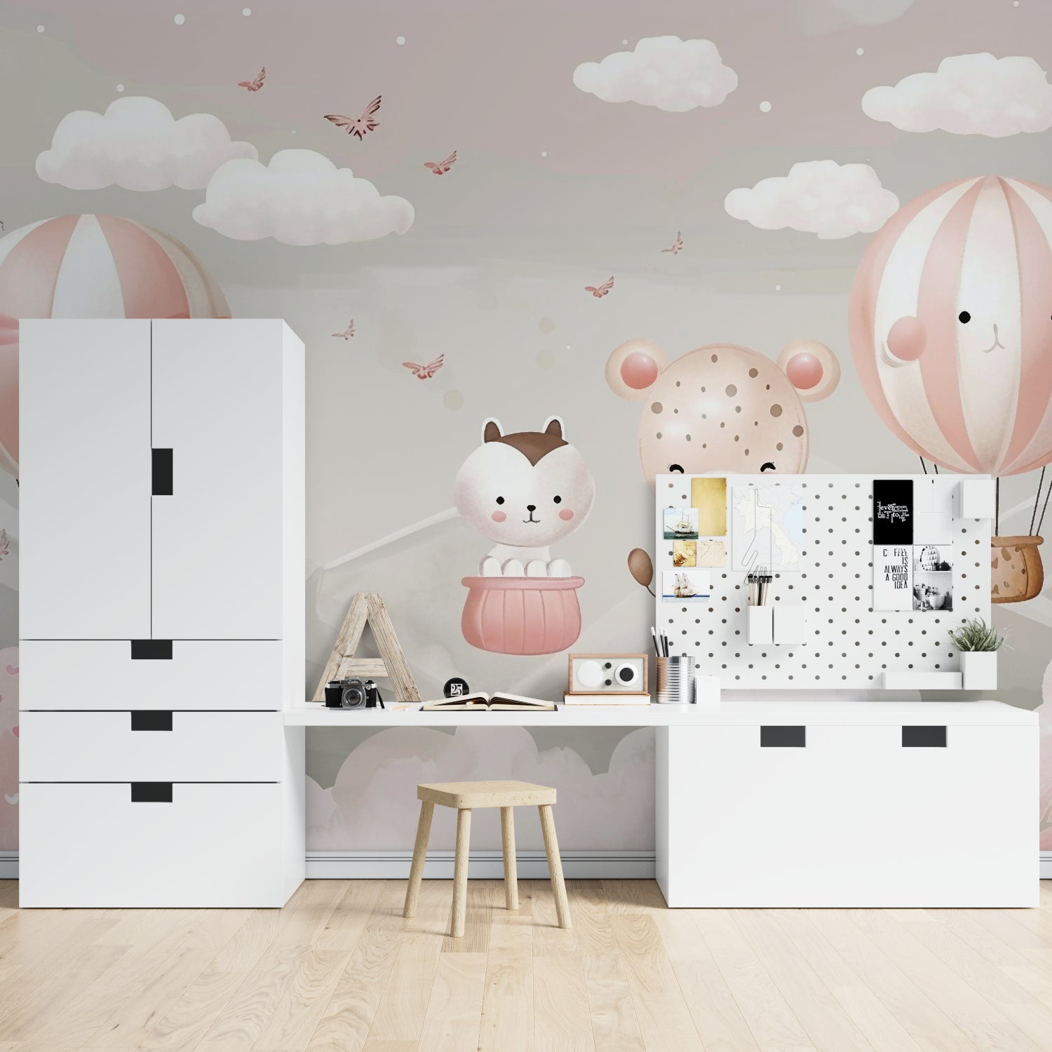 Playroom with hot air balloon wall mural showcasing soft pink and gray tones