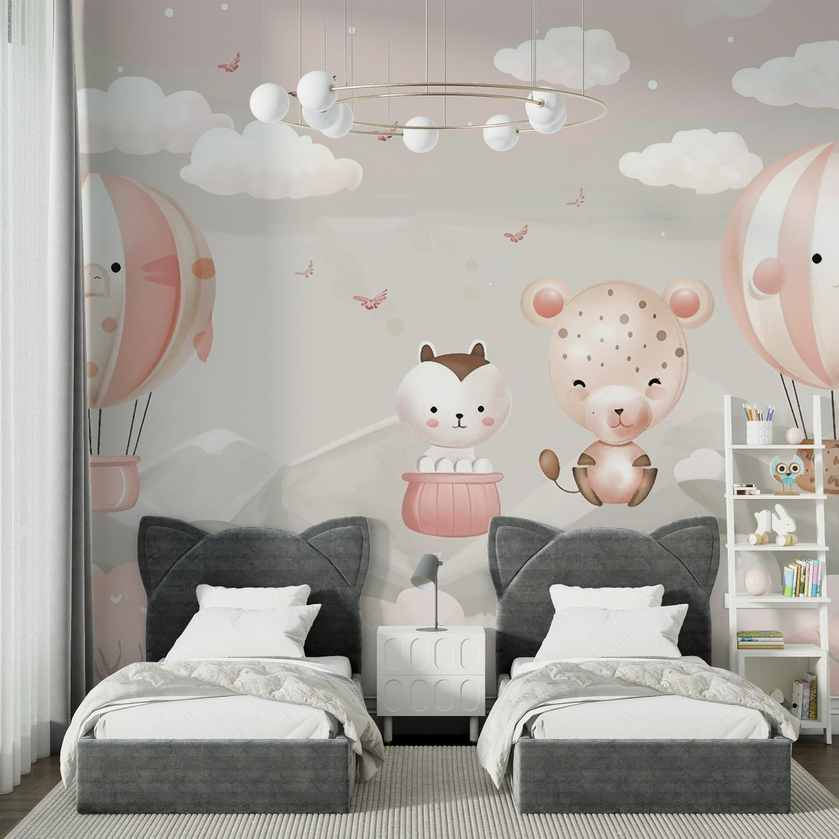 Kids reading nook with whimsical balloon and animal wallpaper design