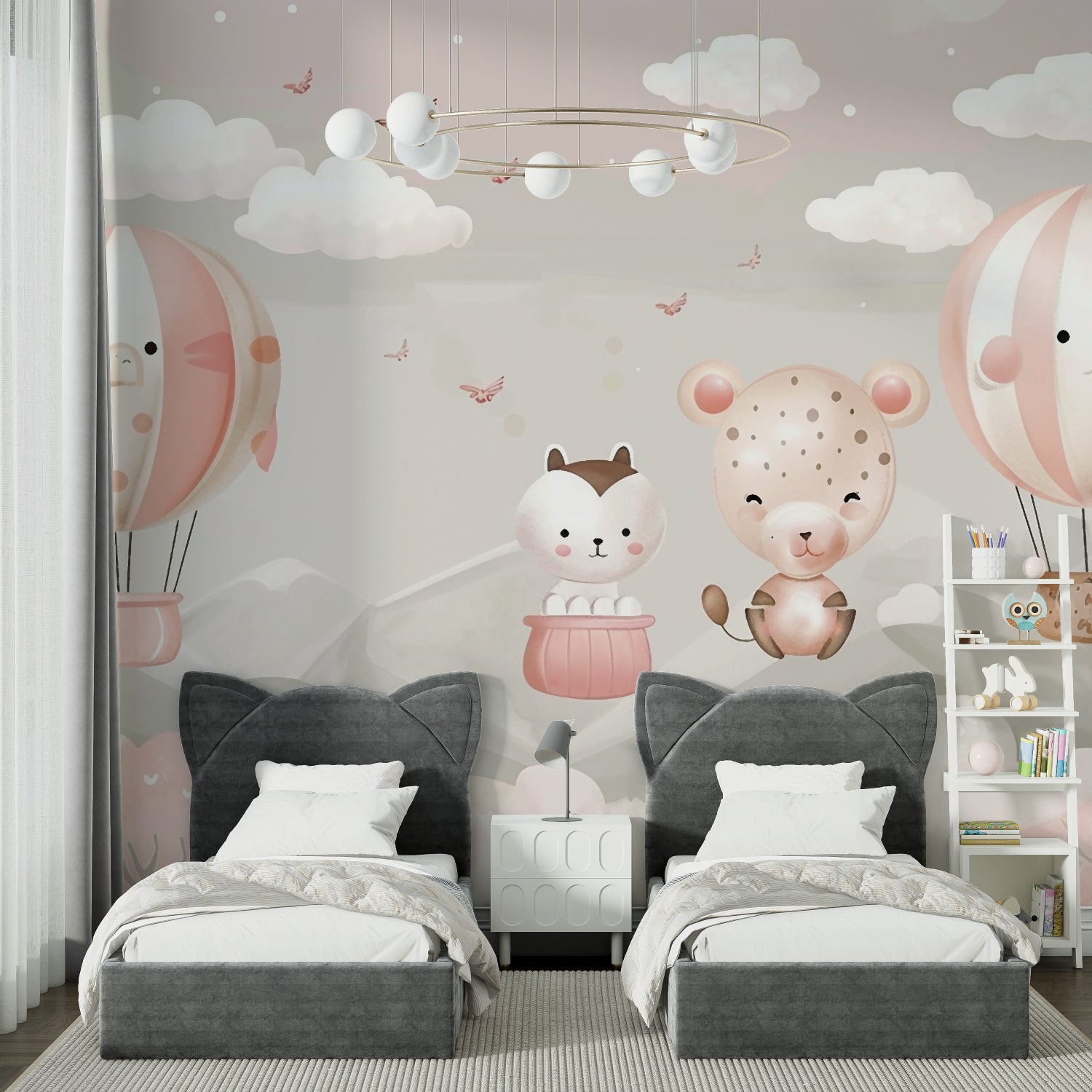 Kids reading nook with whimsical balloon and animal wallpaper design