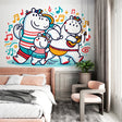 Musical Hippos family wallpaper creating a playful atmosphere in a bright children's bedroom with colorful furniture
