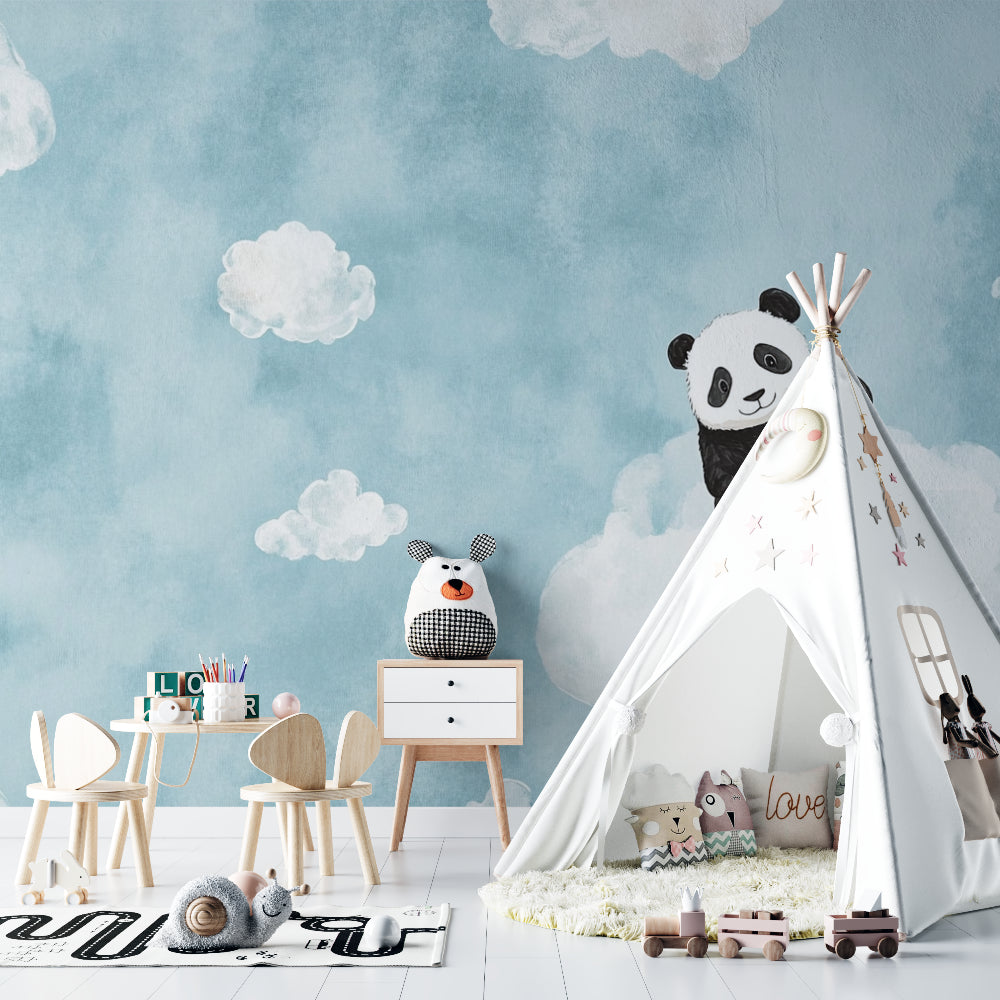 Nursery wall design with floating panda in a minimalist playroom setting